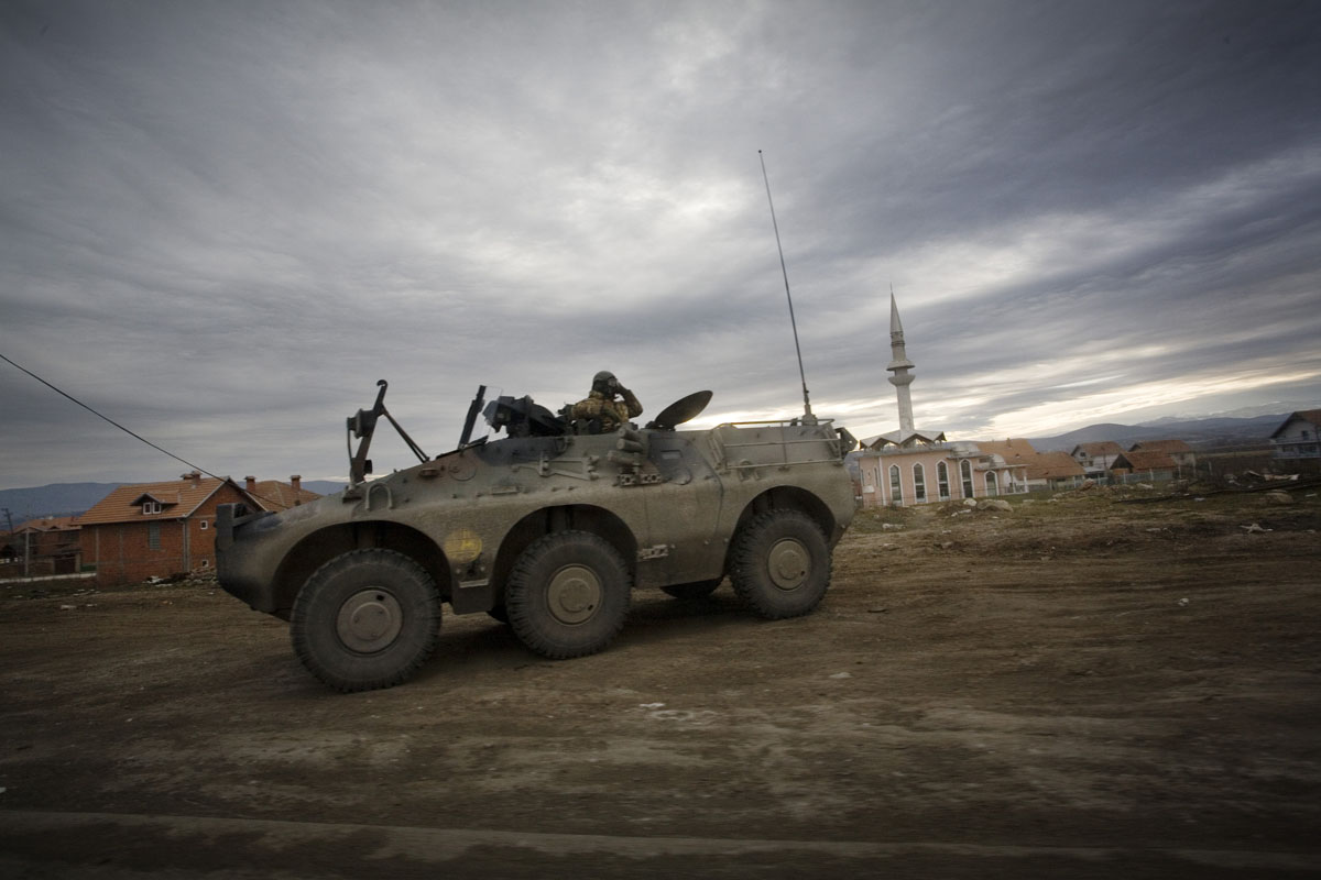 Italian KFOR troops stationed along the Pristina - Mitrovica road.